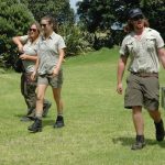 Zoo staff escorting kiwi to prepared burrow